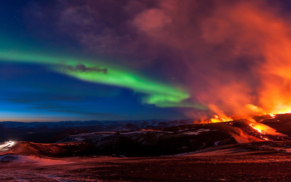 Download Aurora Lights Over Lava Volcano wallpaper