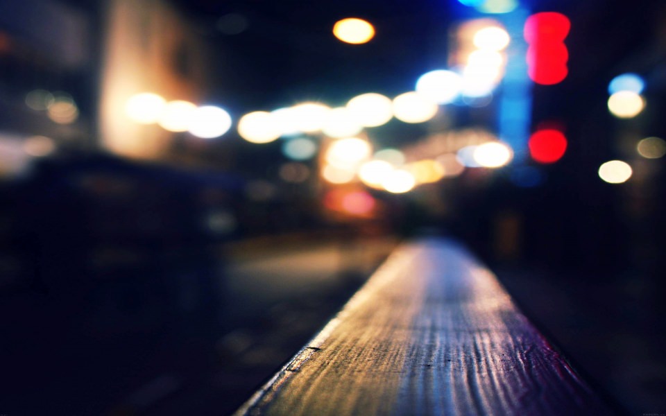 Download Blurred View of a City wallpaper