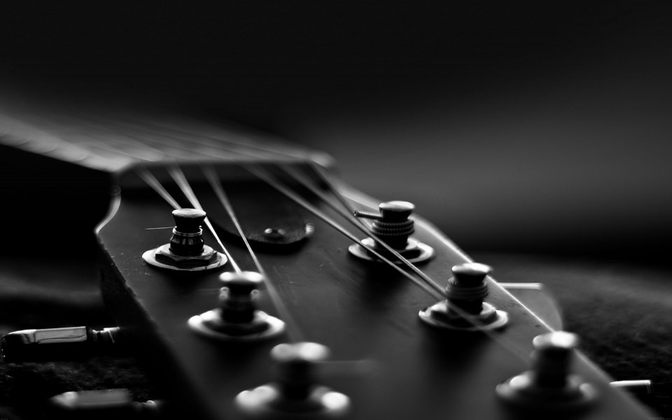 Download Close-Up Of Guitar Strings wallpaper