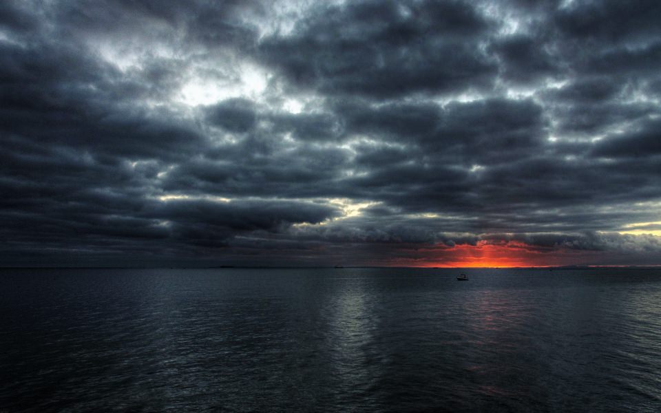 Download Dark Stormy Clouds At Sea wallpaper