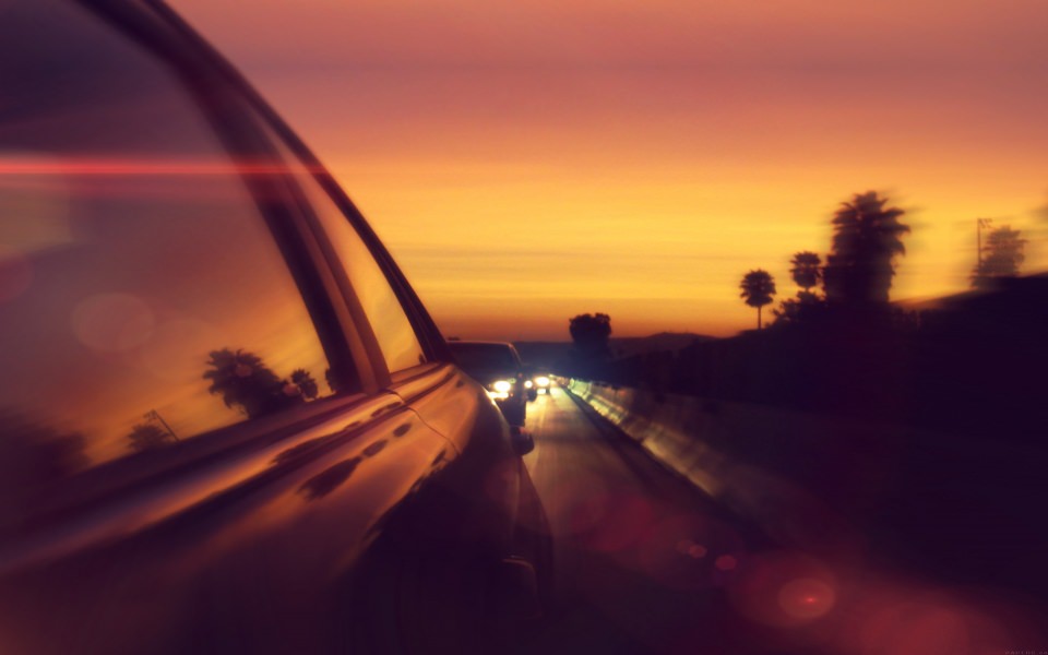 Download Driving Through Sun Set wallpaper