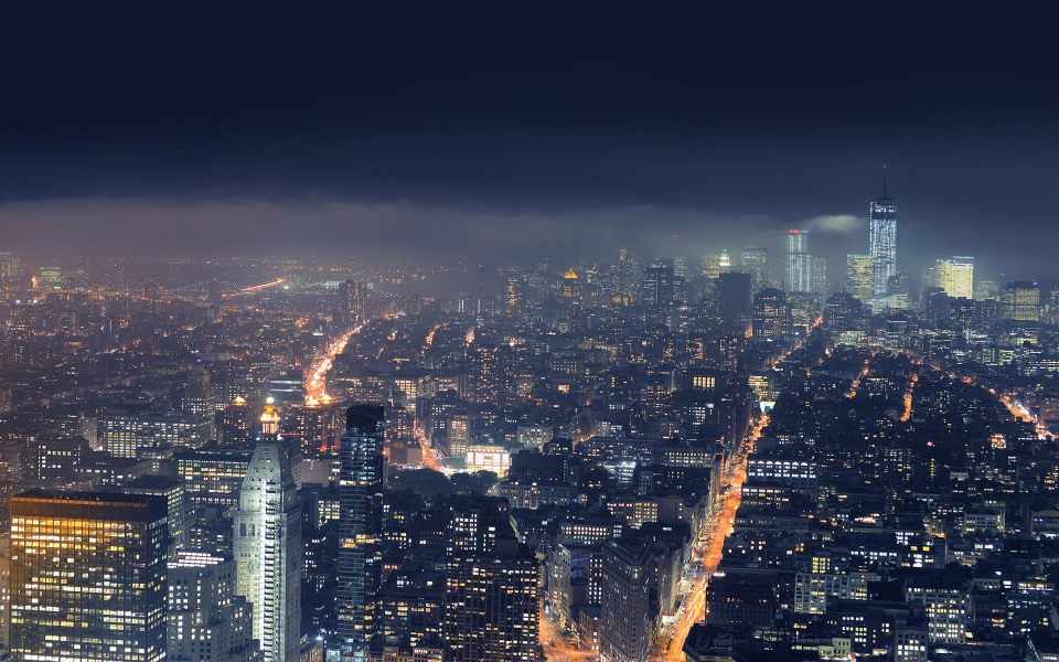 Download Night Time View Over Lit Up City wallpaper