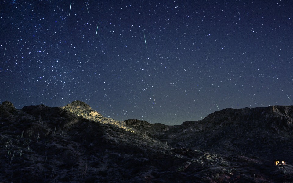 Download Shooting Stars Over Mountain wallpaper