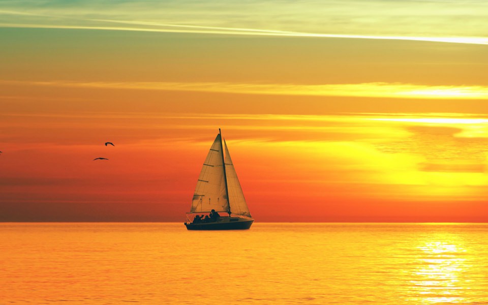 Download Sunset Over Sea and Lonely Boat wallpaper
