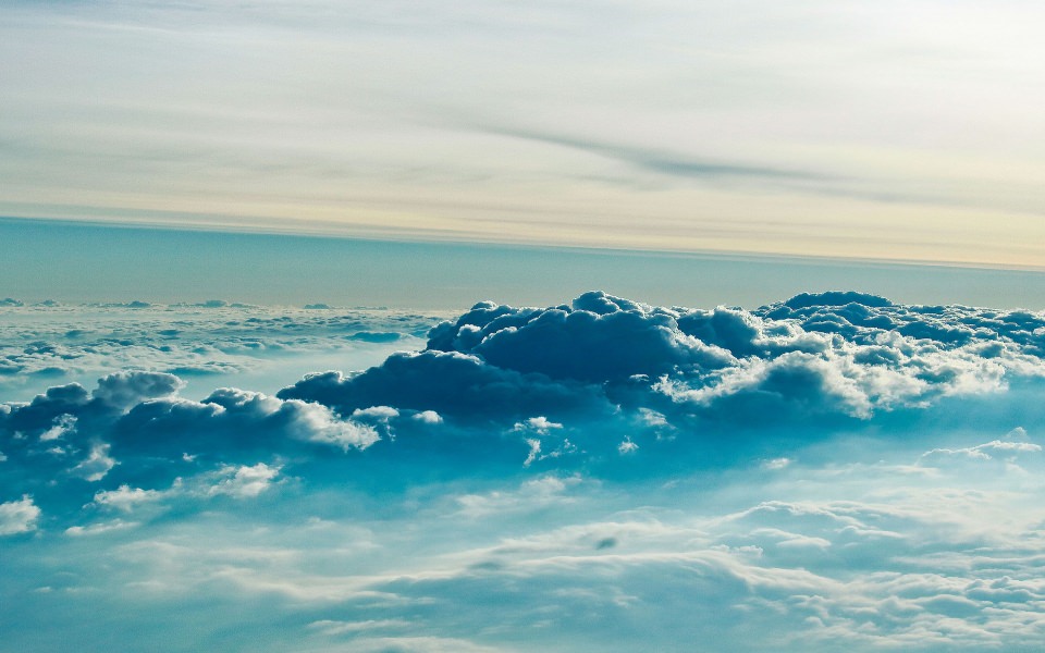 Download Thick Fluffy Clouds wallpaper
