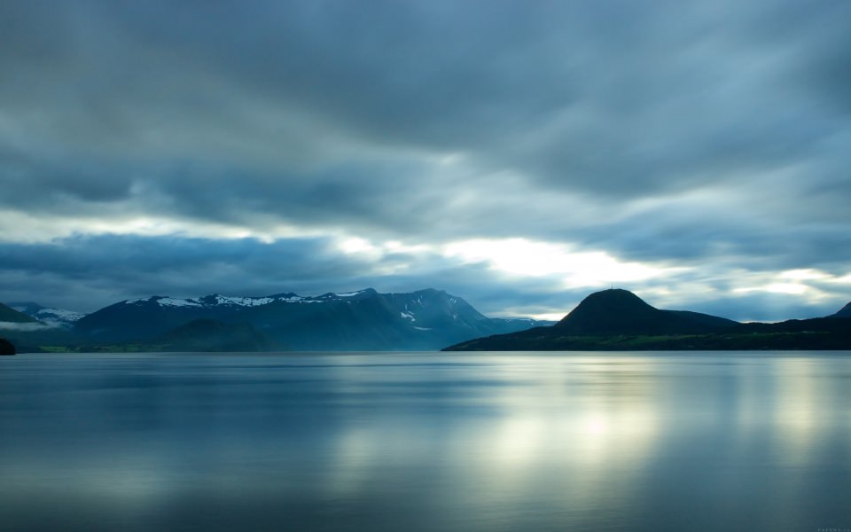 Download View Across Lake At Mountains wallpaper