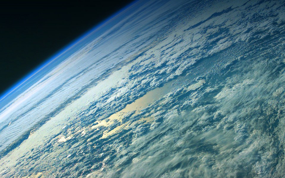 Download View Of Cloudy Earth wallpaper