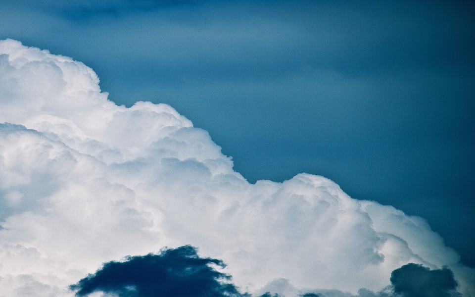 Download White Fluffy Clouds wallpaper