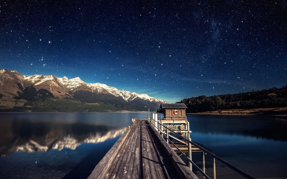 Download Nighttime Serenity Wooden Dock on a Starlit Lake HD Wallpaper wallpaper