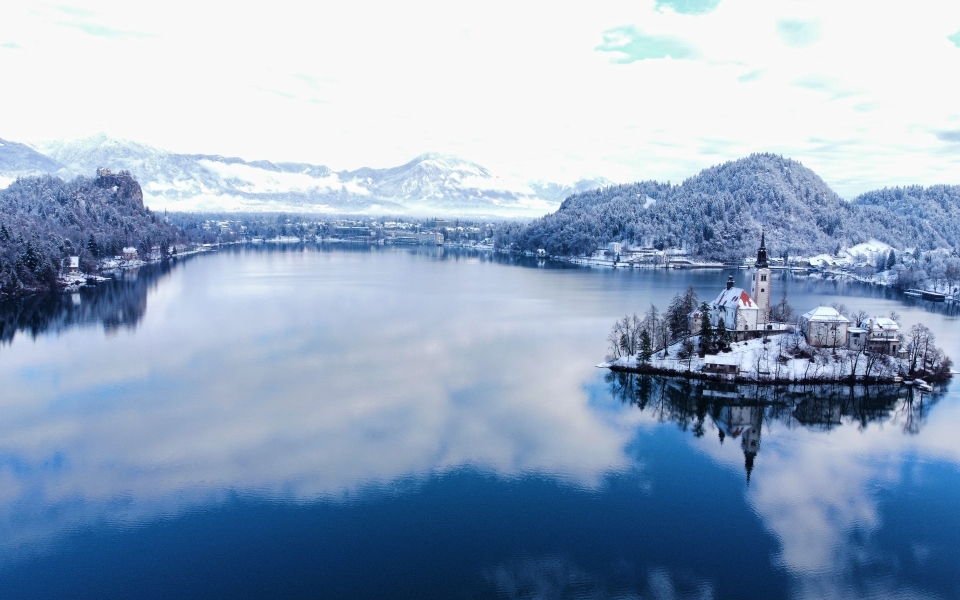 Download Winter Wonderland at Lake Bled Beautiful Nature in the Julian Alps HD Wallpaper wallpaper
