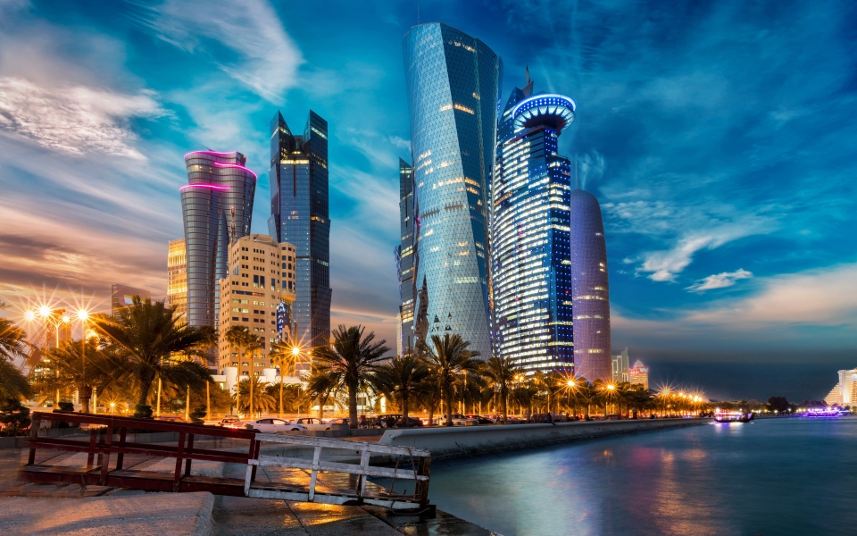 Download Doha Nightscape Modern Skyscrapers Along the Embankment HD Wallpaper wallpaper