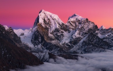 Red Sky Behind Snowy Mountains