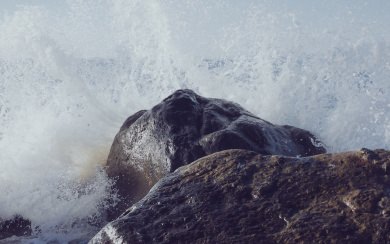 Wave Hitting Rock