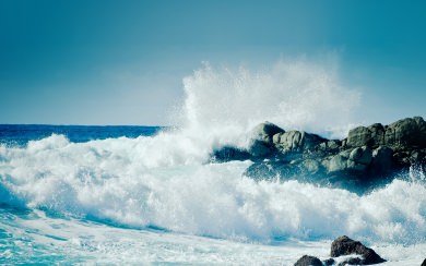 Waves Crashing On Large Rocks