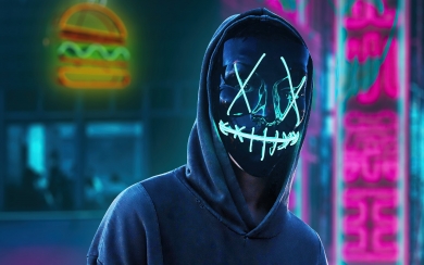 Add a Touch of Mystery to Your Screens with HD Wallpapers of the Black Mask Hoodie Boy in the City
