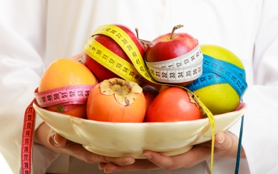 Weight Loss Concepts HD Wallpaper of Slimming Apples and Measuring Ribbon